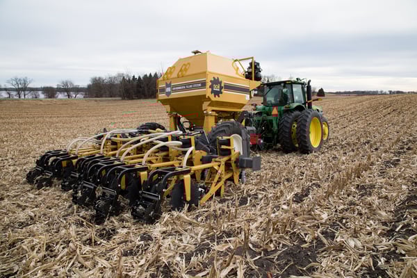 SoilWarrior 3100 strip tillage and nutrient placement system in high residue corn field