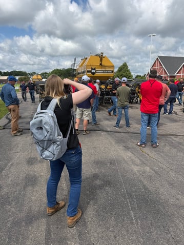 Elise Heckmann taking photos at SoilWarrior Academy