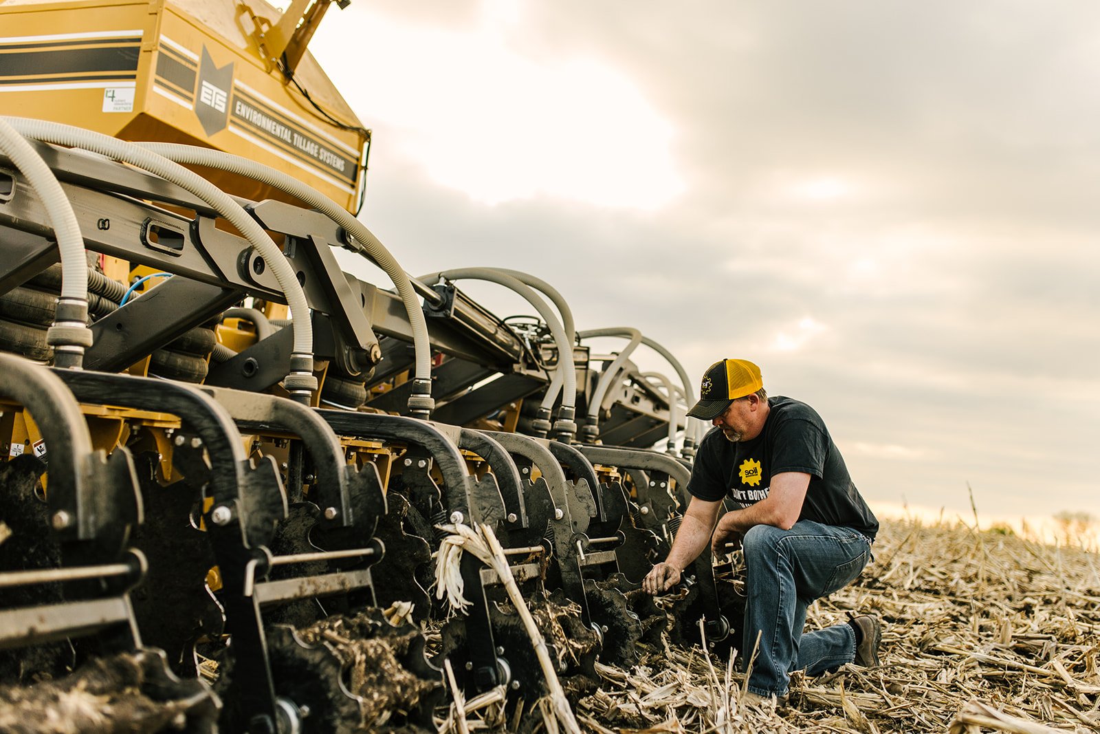 Man working on Soil Warrior in the field